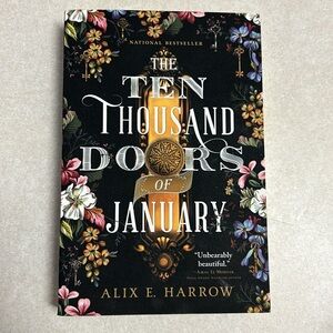 The Ten Thousand Doors of January. Paperback book by Alix E. Harrow.